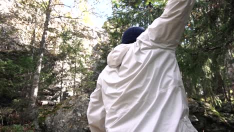 person hiking in a forest