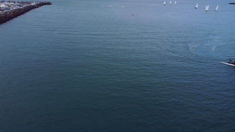 Aerial-shot-over-Surf-ski-race-in-Gran-Canaria,-Spain