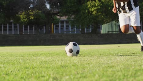 video of diverse group of male football players playing football