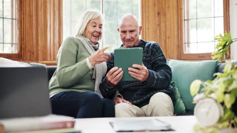 Tablet,-conversation-and-senior-couple-on-a-sofa