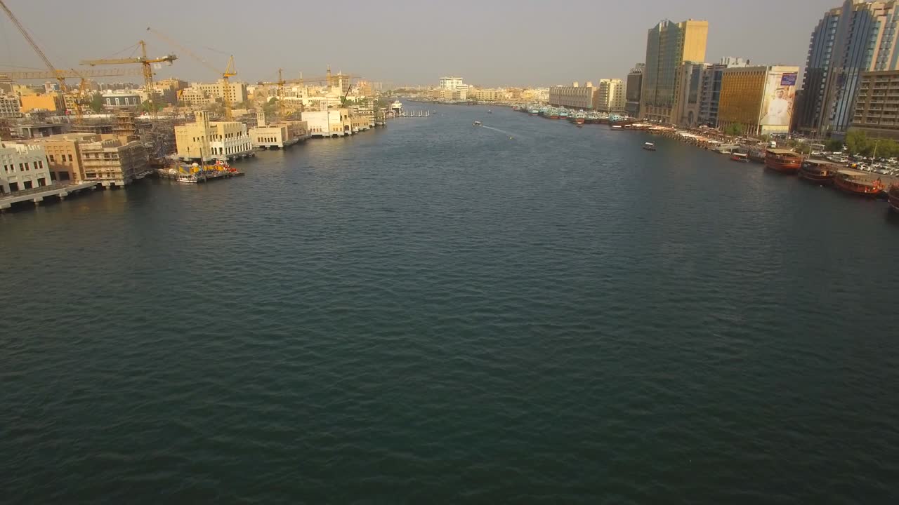 Aerial. Dubai Creek. Historic center of the United Arab Emirates. Sunrise. 4K