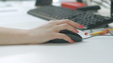 person using a computer mouse