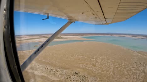 aerial view of callabonna lake landscape, pov from small touristic aircraft, south australia