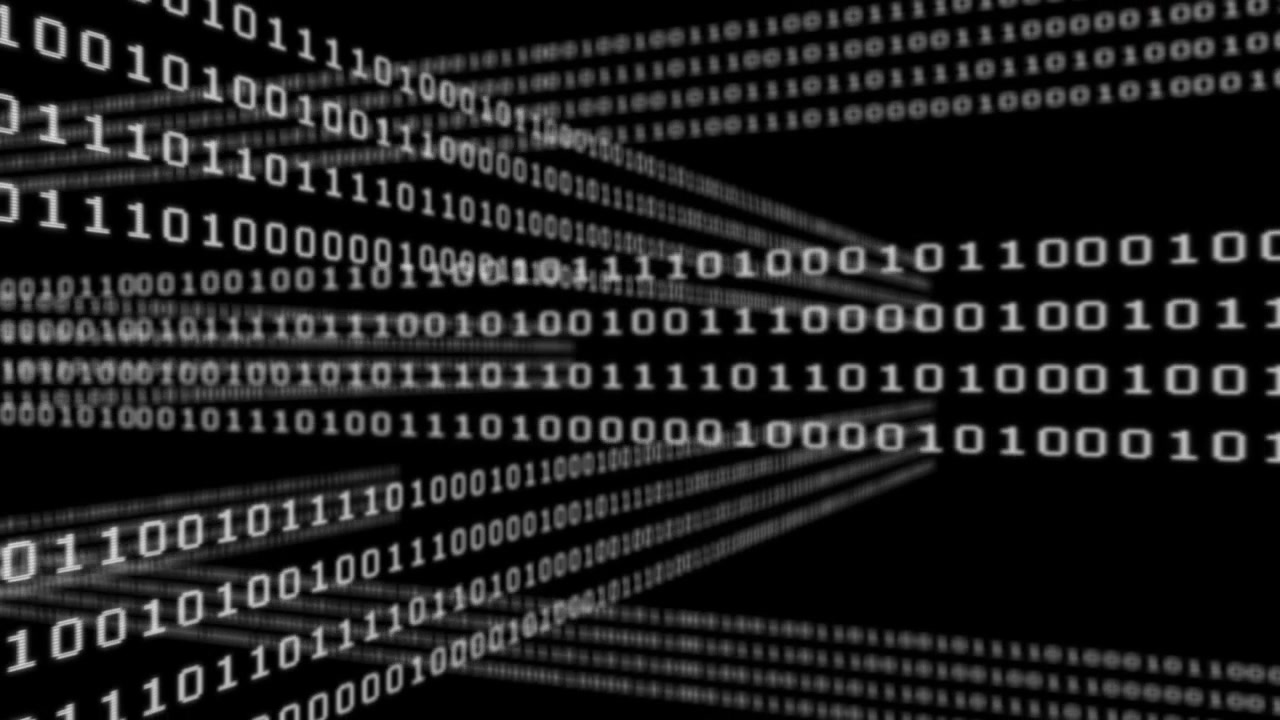 Animation of white binary code moving over black background