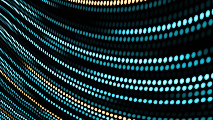 Animation of blue and yellow dotted light trails moving in hypnotic motion on seamless loop