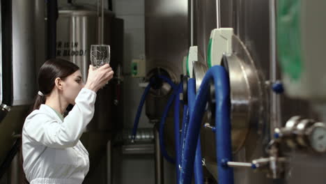 woman doing control at brewery