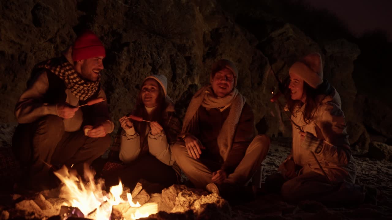 Friends Enjoying a Night by the Campfire