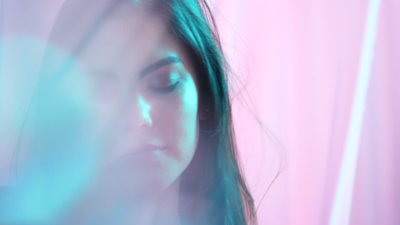 Beauty, fabric and face with a woman in studio