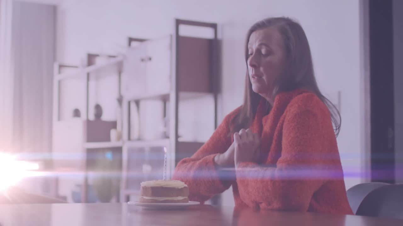 animación de luces brillantes sobre una triste y solitaria mujer caucásica