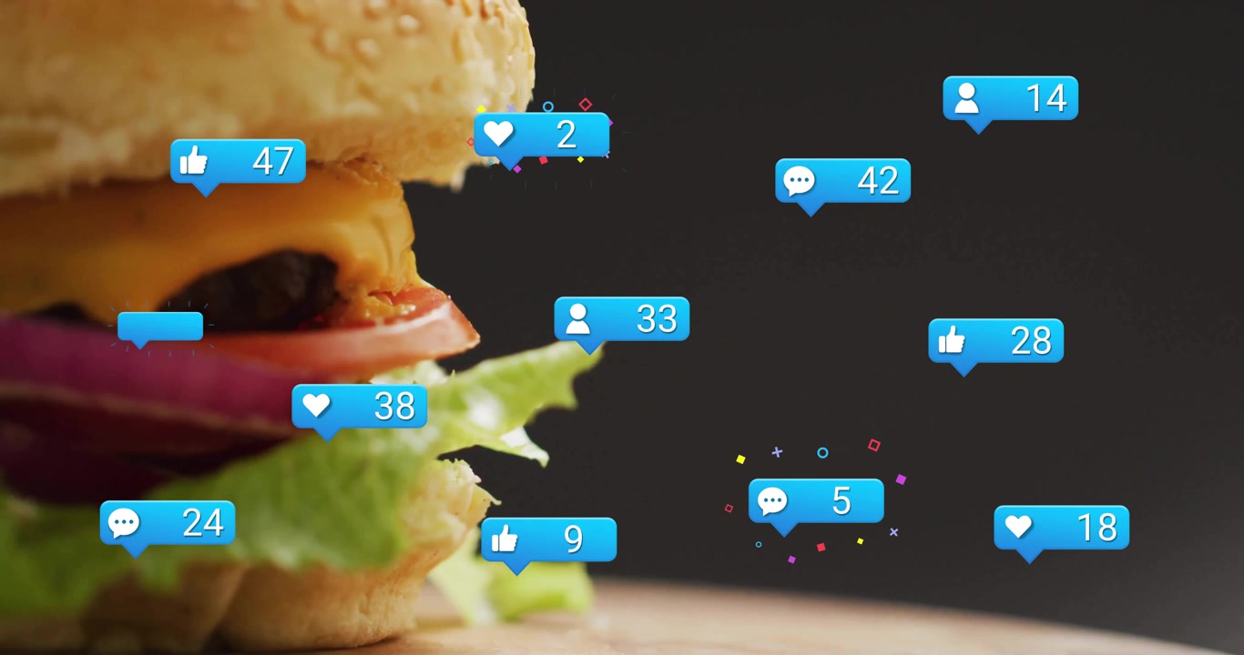 Social bubbles rising around sesame seed cheeseburger on board triggered by engagement rise