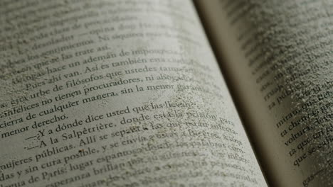 Hand Reading an Old Book