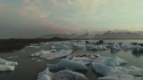 floating glacier icebergs in serene, beautiful iceland landscape, aerial