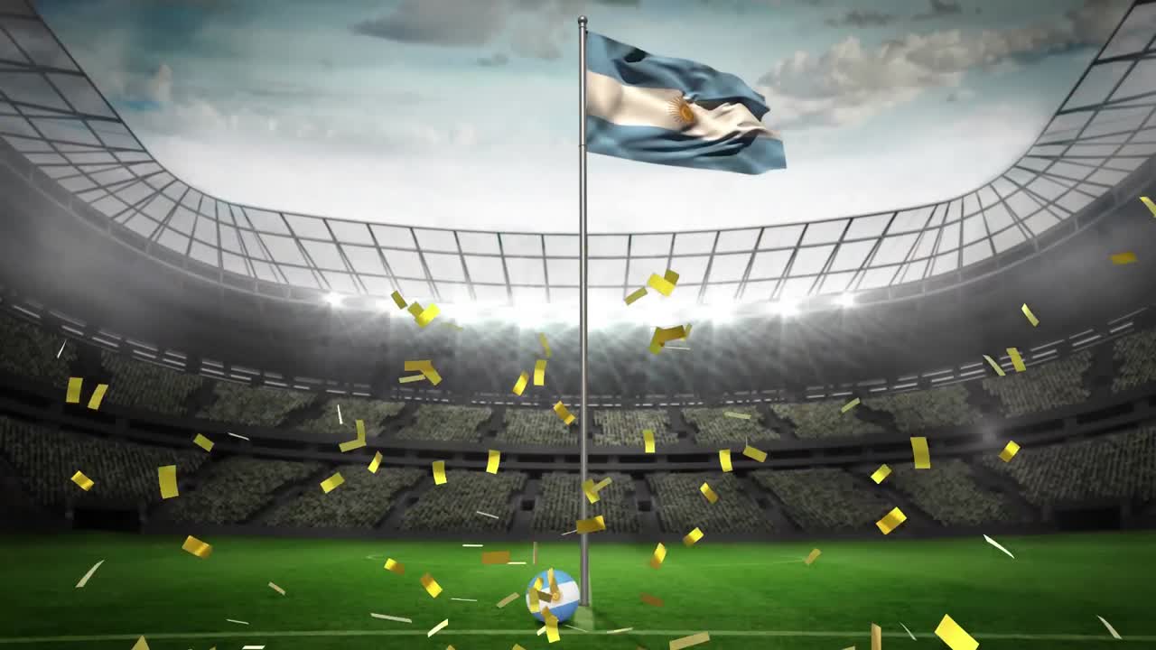 골든 콘페티가 아르헨티나  ⁇ 발을 흔들고 뒤에 스포츠 경기장을 향해 떨어지고 있습니다.