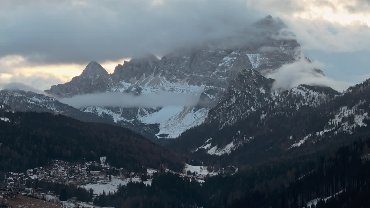 Aerial drone view of the Selva di Cadore commune surrounded by the Dolomites mountains in Italy