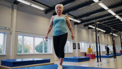 senior woman exercising in a gym
