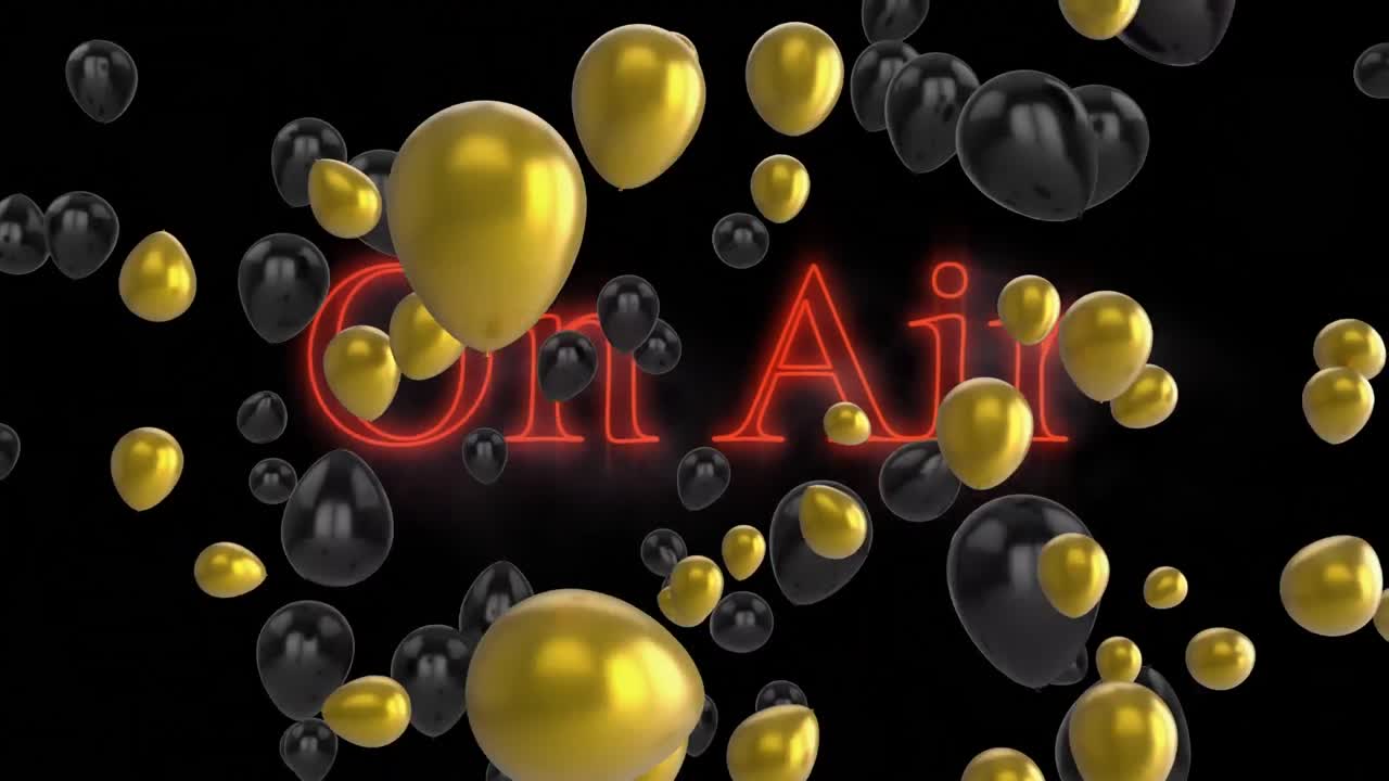 globos dorados y negros flotando sobre el rojo neón en un cartel de texto en el aire contra un fondo negro