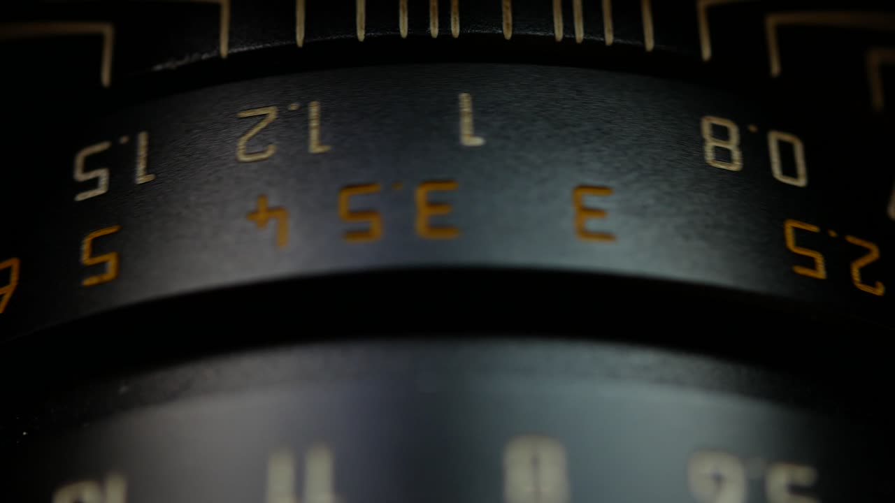 a black lens that turns a aperture