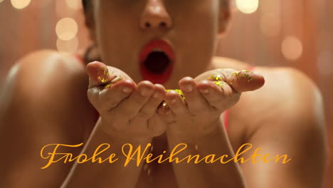 animation of frohe weihnachten text banner against caucasian woman blowing sparkles