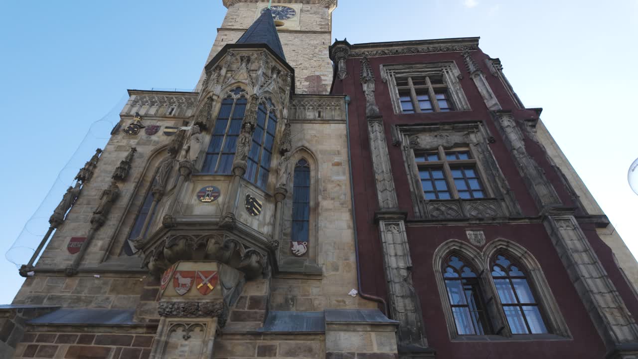 Prague's Astronomical Clock Tower displaying ornate gothic architecture and intricate historical details in Czechia