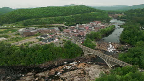 serene river and stunning bridge in rumford, maine