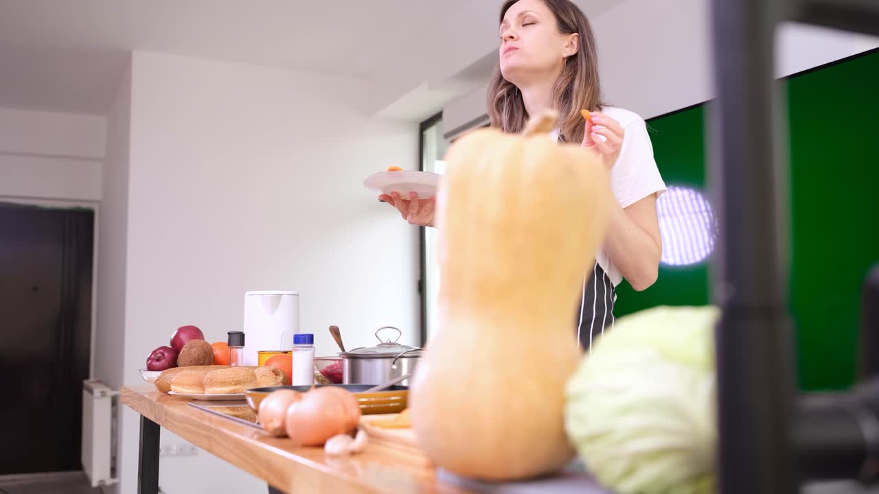 Woman cooking healthy food in the kitchen
