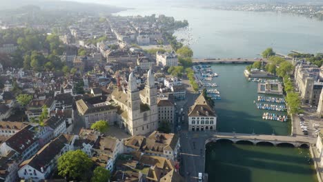 flying away from grossmünster church in zurich's old town neighborhood