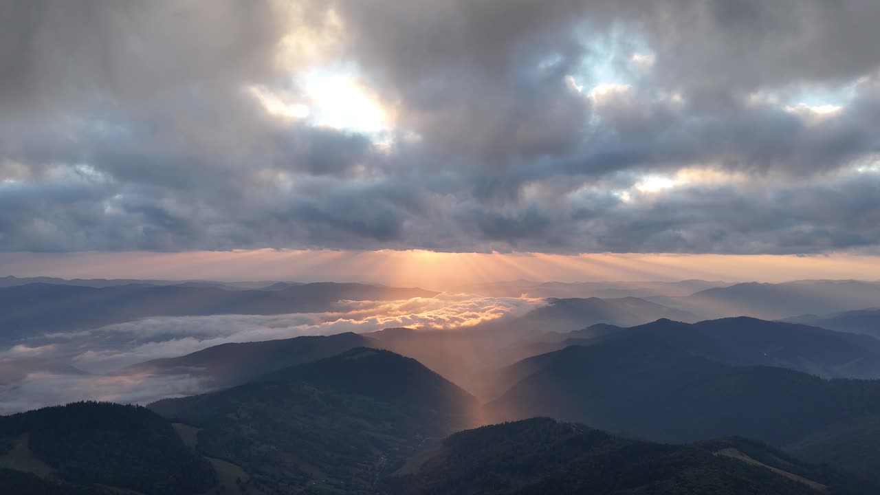 Drone shot at sunrise near Dochia Chalet, Ceahlău Mountains, Romania in September
