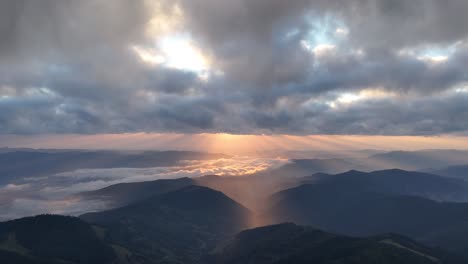drone shot at sunrise near dochia chalet, ceahlău mountains, romania in september