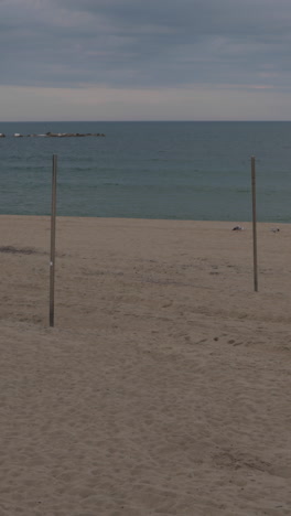 barcelona beaches almost empty during the coronavirus lockdown in vertical