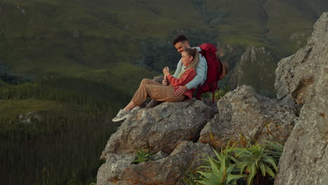 Hiking,-mountain-and-love,-couple-relax-on-outdoor