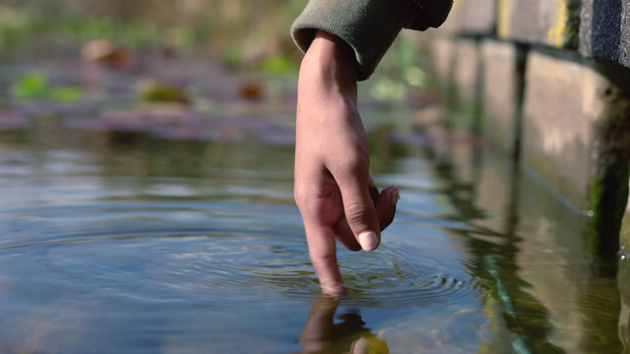 Close up woman's finger gently touching