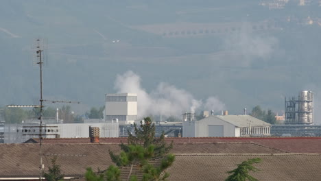 industrial factory pollution, chemical smoke from chimney, toxic gas steam in city