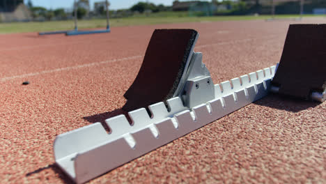 close-up of starting blocks on a running track 4k