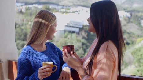 young women chatting on an open-air patio