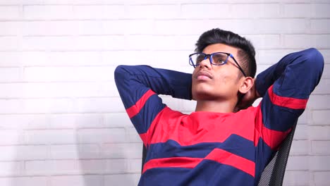 teenager relaxing in chair