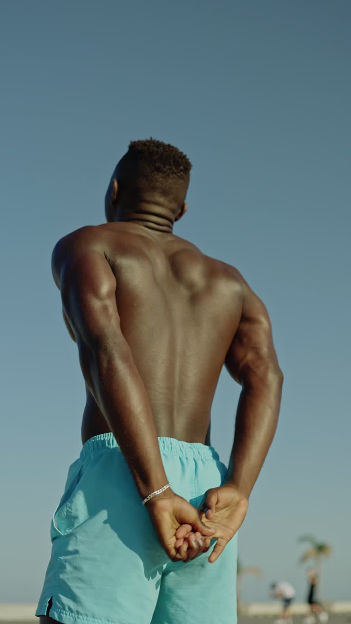 Muscular man on the beach