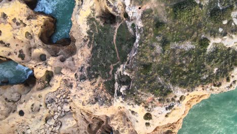 birdseye view of karst rock formations surrounded the beautiful blue water