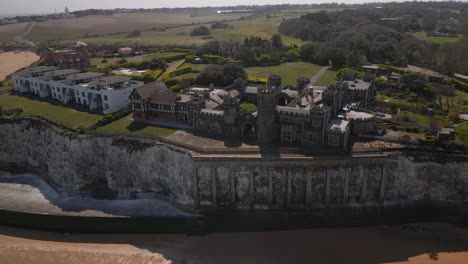 kingsgate castle kent seaside english chalk cliff coastal bay landmark aerial view high angle dolly left