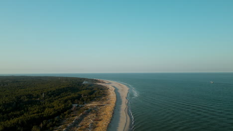 Idyllic Ocean With Boat Sailing During Summer In Hel Peninsula Beach, Puck Bay, Poland