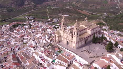 amazing view of olvera spain the white city with mountains in the background, aerial