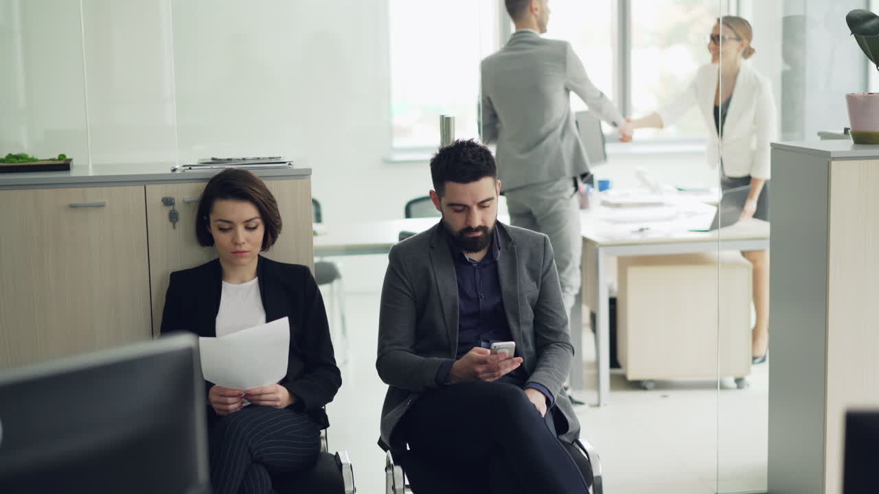 Business People Waiting in an Office