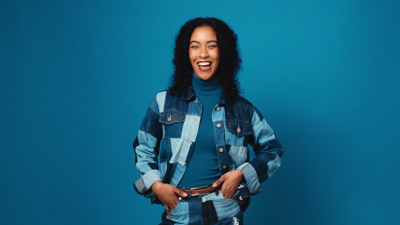 Portrait of a smiling woman in denim jacket