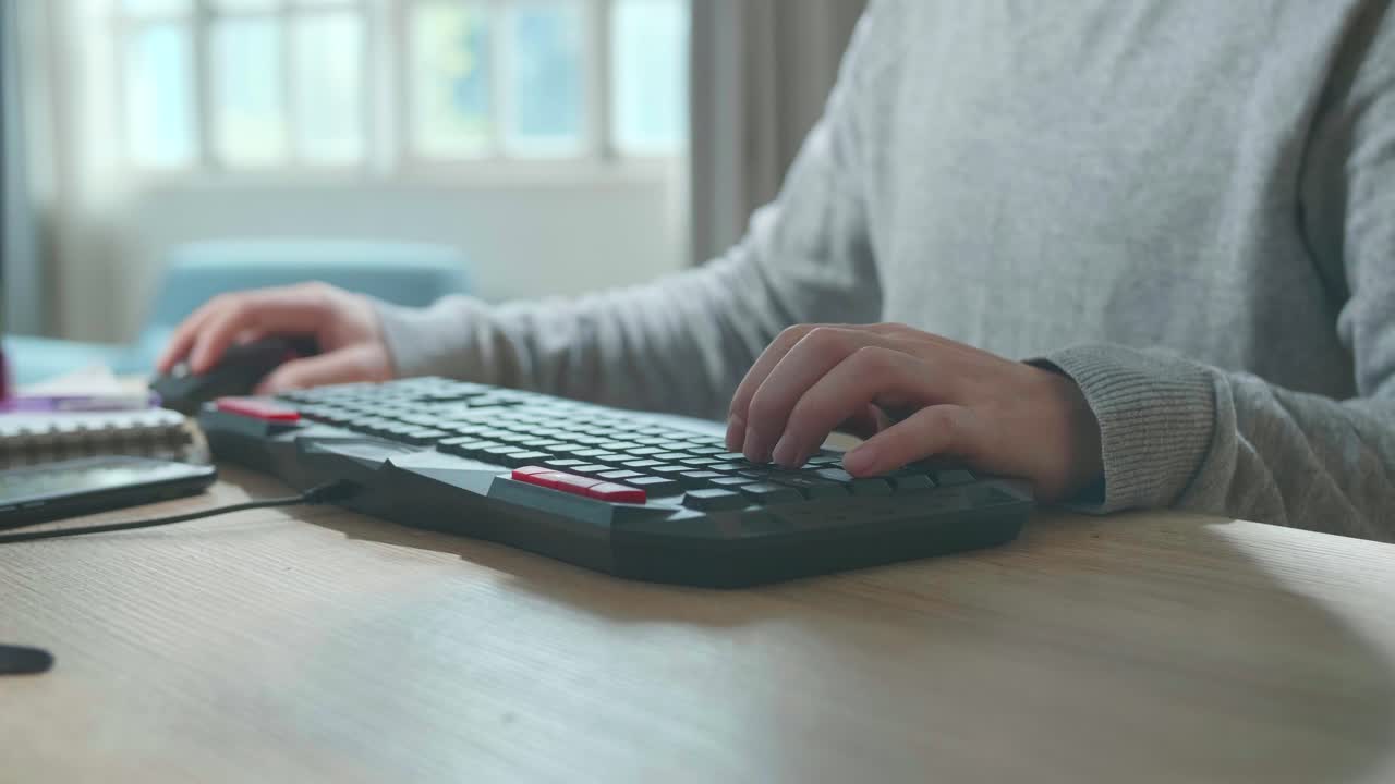 Close Up Of Hands Man Typing On Desktop Computer While Working At Home.