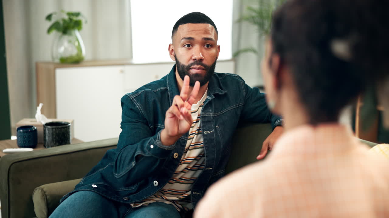 A couple having a serious discussion during therapy