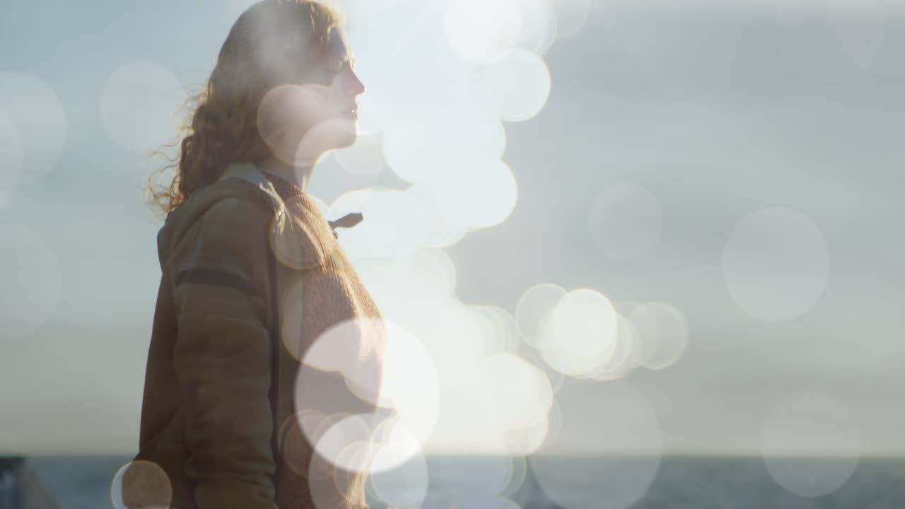 슬프고 외로운 백인 여성 위에 반 ⁇ 이는 불빛의 애니메이션