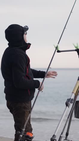 A man fishing by the sea