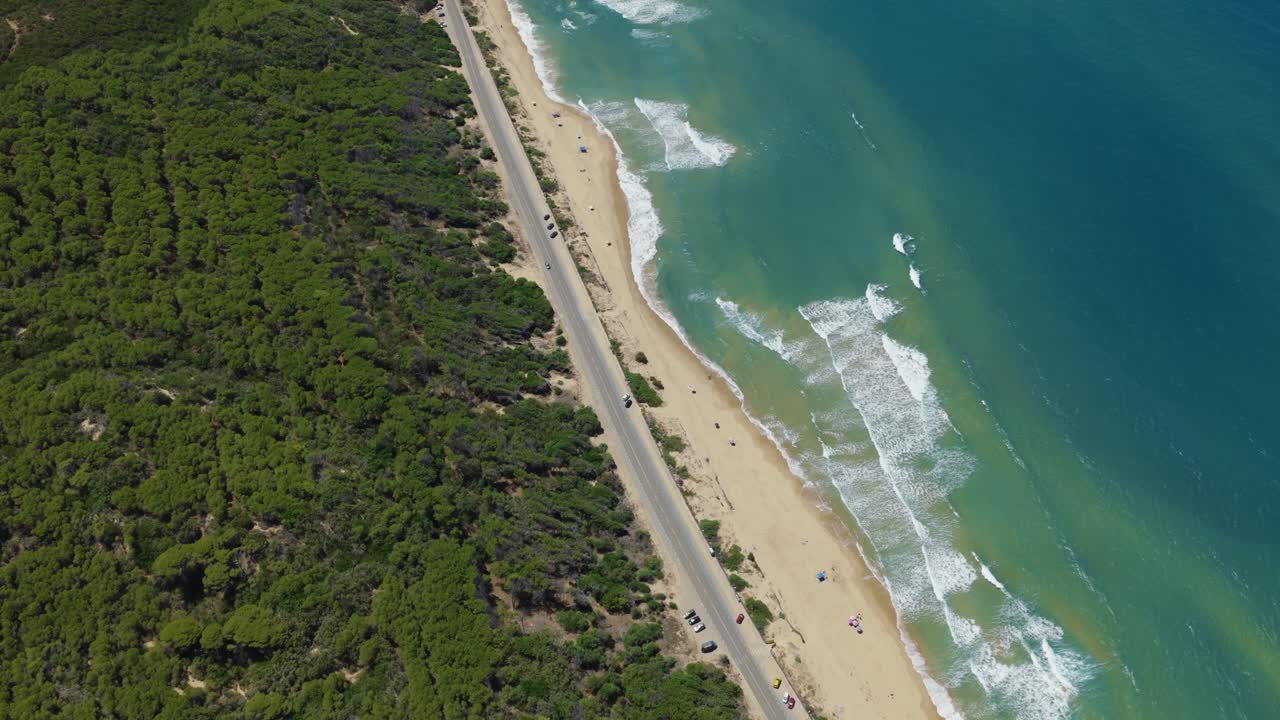 Aerial view of San Nicolò beach in Sardegna with vivid ocean and sand