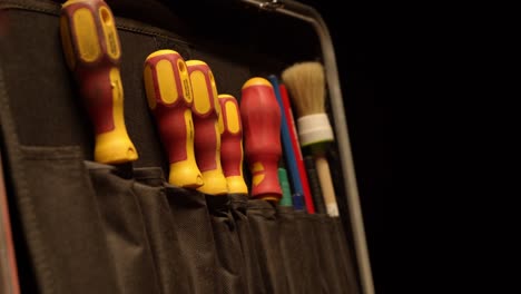 a man opening a tool box