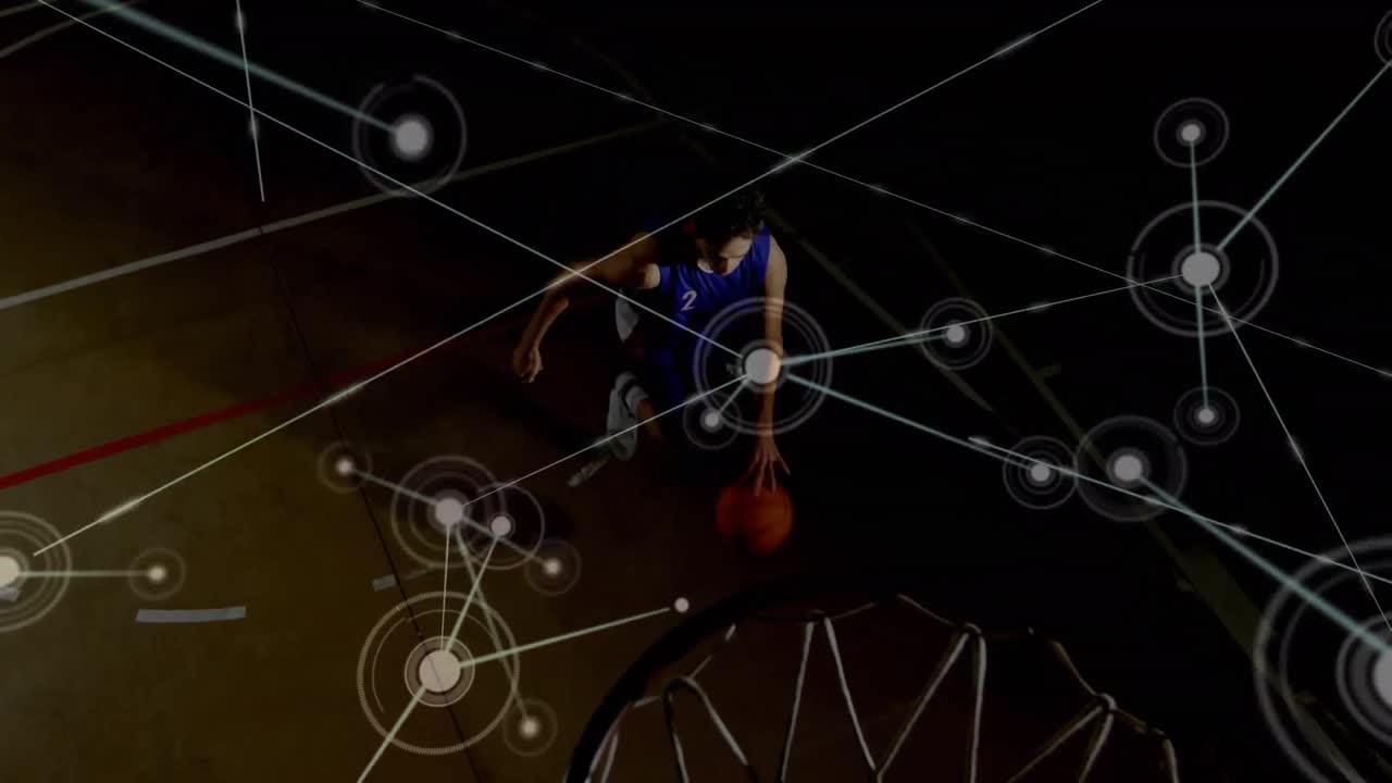 Animation of networks of connections over mixed race male basketball player at gym