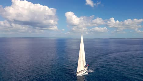 luxury white oyster 82 yacht sailing on blue ocean water